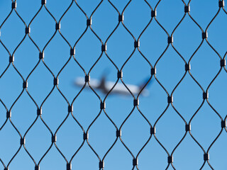 Fototapeta premium Safe Air Traffic Overhead: A Symbolic Image of Aviation Security