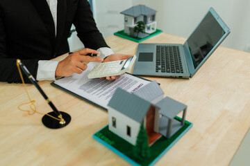 An insurance agent in the process of pitching a policy.