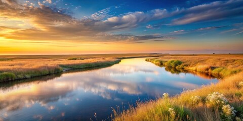 Serene Sunset over a Calm River Reflecting Colorful Clouds in a Peaceful Meadow