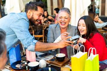 Friends sharing laughter and memories with vintage camera in murcia