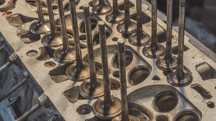 Part of car's motor. Car engine valves close up. Machinery detail of modern gasoline engine repair...