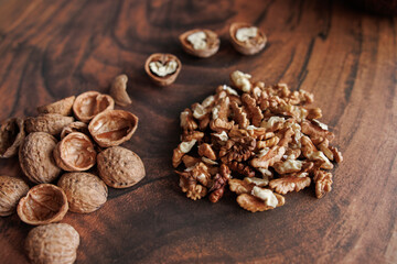 nuts in a bowl and a cup of coffee. top view.
