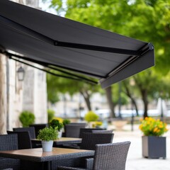 Cozy patio featuring a table and chairs with a sleek retractable awning providing shade for outdoor gatherings