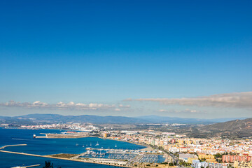 Scenic view of Gibraltar harbor from the Rock of Gibraltar. Port of Gibraltar.