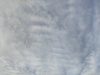 blue sky with lush white clouds