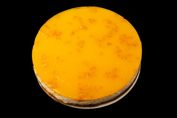Orange cheesecake isolated on a white background.