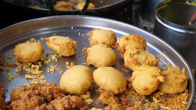 Hot Vada ready to be slided down between pav and eaten