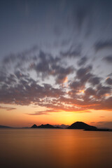 sunset on the beach. Seaside town of Turgutreis and spectacular sunsets. Selective Focus. Long Exposure shoot. tranquility scene.