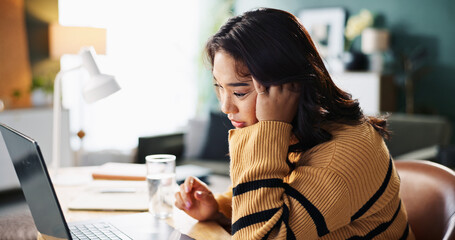 Laptop, remote work or stress with woman in home office for email communication, report or review....