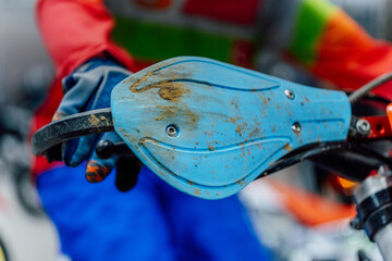 dirty handlebars on a mountain bike. motorcycle in clay after training