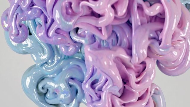 Top-down video shot of pastel-colored slime with a glossy texture, showcasing a swirling, abstract pattern in soft blues and purples. Live desktop wallpaper.