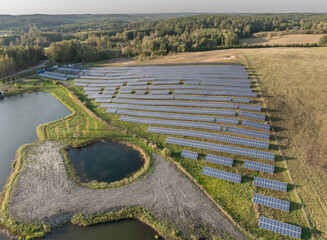 Rows of Photovoltaic Panels. Compose Renewable Energy. Drone Point of View. Solar Power Station 