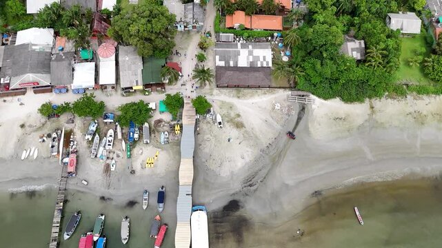 Drone image in motion on a slightly sunny day, with a general view of Ilha do Mel, in the Encantadas region, located in Paranagu&aacute;, on the coast of Paran&aacute; (Brazil).
