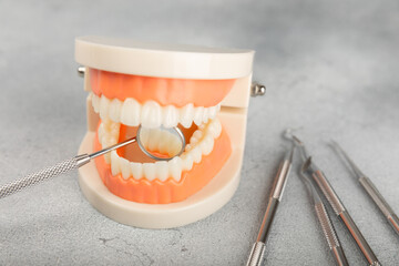 Dentist tools on a blue background. Dentist Concept.Teethcare, dental health concept. Means to care...