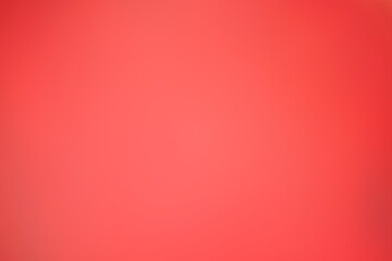 Rote bis orange farbige Hintergrund Fläche mit heller Mitte als elegante Textur