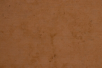 Brown old leather background close up, leather grainy, dusty