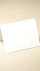 Fototapeta premium Blank White Card Mockup on Beige Background Invitation Design Template