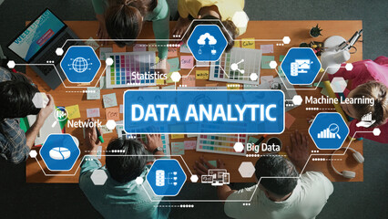 A diverse team collaborates in a workspace focused on data analytic strategy development, utilizing innovative techniques and valuable insights to drive business growth. Amity