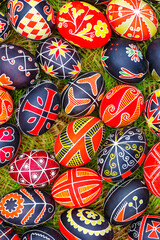 Traditional ornamets on Easter egg -Ukrainian pysanka.Mix of colored easter eggs with the traditional ukrainian slavic designs.Preparation for Christian holiday.