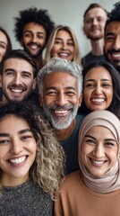 A diverse group of people smiling brightly, radiating happiness and a sense of community spirit.