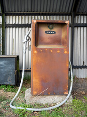 Old gas station with destroyed petrol pumps. Spring time.