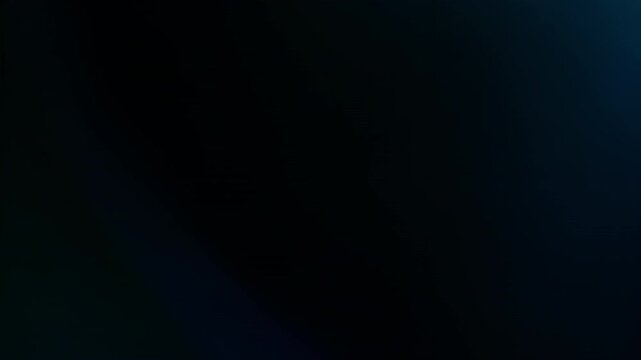 A pulsating blue light leak on a dark background transitions to a solid deep blue gradient. The glowing effect creates a mysterious, abstract scene, ideal for themes of energy and transformation.