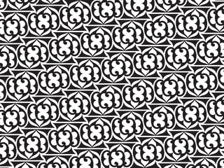 A monochrome pattern composed of many small circles, creating a visually striking black and white effect.