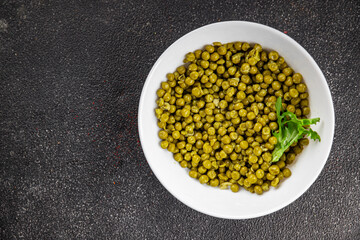 Green peas canned appetizer vegetables dish organic product fresh tasty gourmet food background on the table rustic food top view copy space keto and paleo diet vegetarian and vegan food