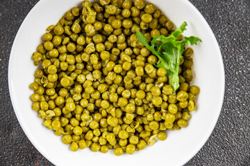 Green peas canned appetizer vegetables dish organic product fresh tasty gourmet food background on the table rustic food top view copy space keto and paleo diet vegetarian and vegan food