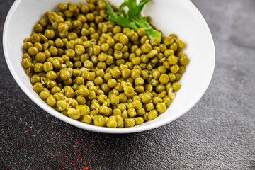 Green peas canned appetizer vegetables dish organic product fresh tasty gourmet food background on the table rustic food top view copy space keto and paleo diet vegetarian and vegan food