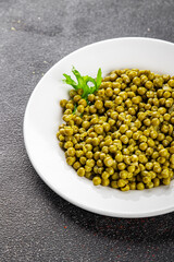 Green peas canned appetizer vegetables dish organic product fresh tasty gourmet food background on the table rustic food top view copy space keto and paleo diet vegetarian and vegan food