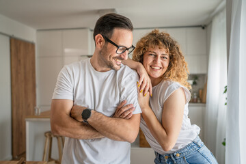Happy adult caucasian couple at home husband and wife family concept