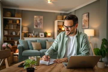 one man adult caucasian work on laptop at home happy smile
