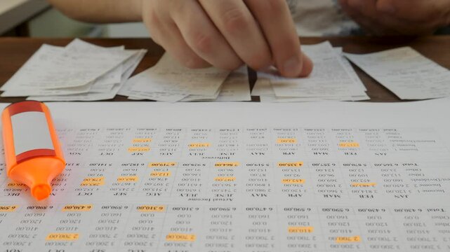 Monthly budget organization with clear spending notes. Household financial plan with income and cost breakdown. Highlights help prioritize expenses and control finances responsibly