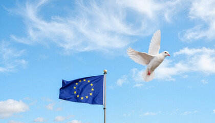 White dove flying near European Union flag against blue sky