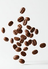 Obraz premium coffee beans floating in the air against white background