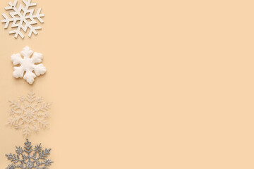 Christmas decorative snowflakes on beige background