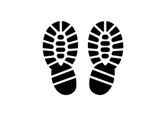 Footprint Impression: A striking black and white image showcases a pair of shoe footprints, a clear representation of movement and direction. The footprints are crisp and detailed.