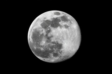 Fototapeta premium A solitary full moon stands out against a stark black and white backdrop, featuring a precise clipping path.