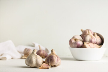 Fresh garlic and clove on white background