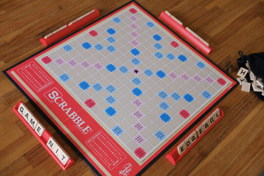 Scrabble game board and pieces