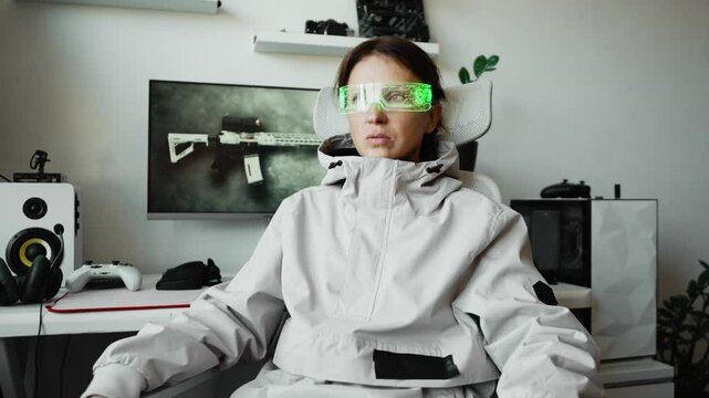 Hooded cyber specialist working on secured network, ensuring privacy protection and digital safety. White background and glowing neon interface emphasize concept of anonymity and data encryption.