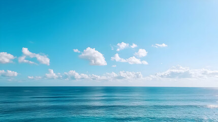 Fototapeta premium Vast Ocean With Fluffy Clouds Under Clear Sky