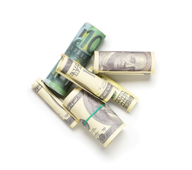 Rolls of banknotes on white background
