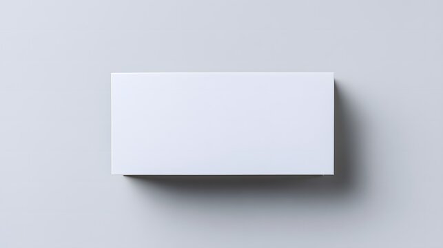 Blank white card on a flat surface, symbolizing simplicity and clarity in design