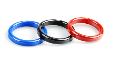 Naklejka premium Colorful Rubber Rings in Blue, Black, and Red Arranged on a Bright Background for Fun Use
