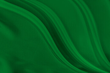Obraz premium Black green satin dark fabric texture luxurious shiny that is abstract silk cloth background with patterns soft waves blur beautiful.