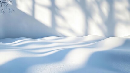 Fototapeta premium Abstract winter background featuring snow, sunlight rays, and wall shadows, ideal for product presentations and winter-themed concepts.