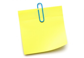 A yellow sticky note attached with a blue paper clip isolated on a white background studio shot
