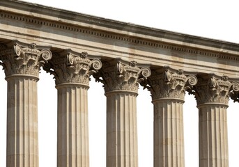 Obraz premium A close up view of several corinthian columns with detailed carvings against a white background